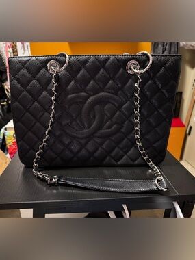 Beautiful quilted, black tote with silver chain straps